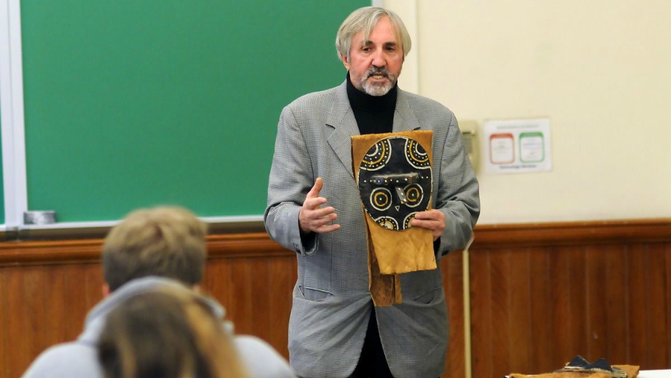 Students in anthropology class with skeleton